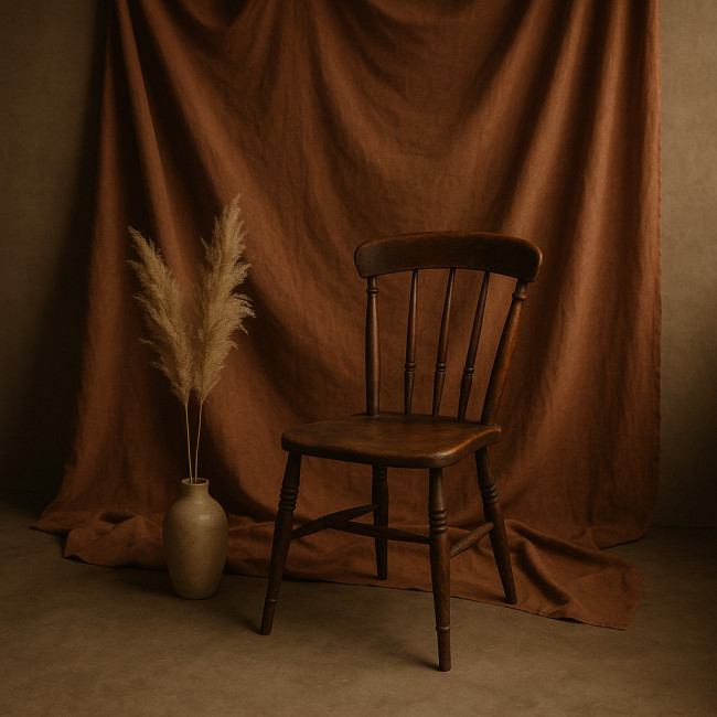 Budget-friendly artistic nude shoot set with recycled backdrop and vintage chair
